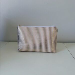 Vince Camuto White and Gold Striped Cosmetic Bag